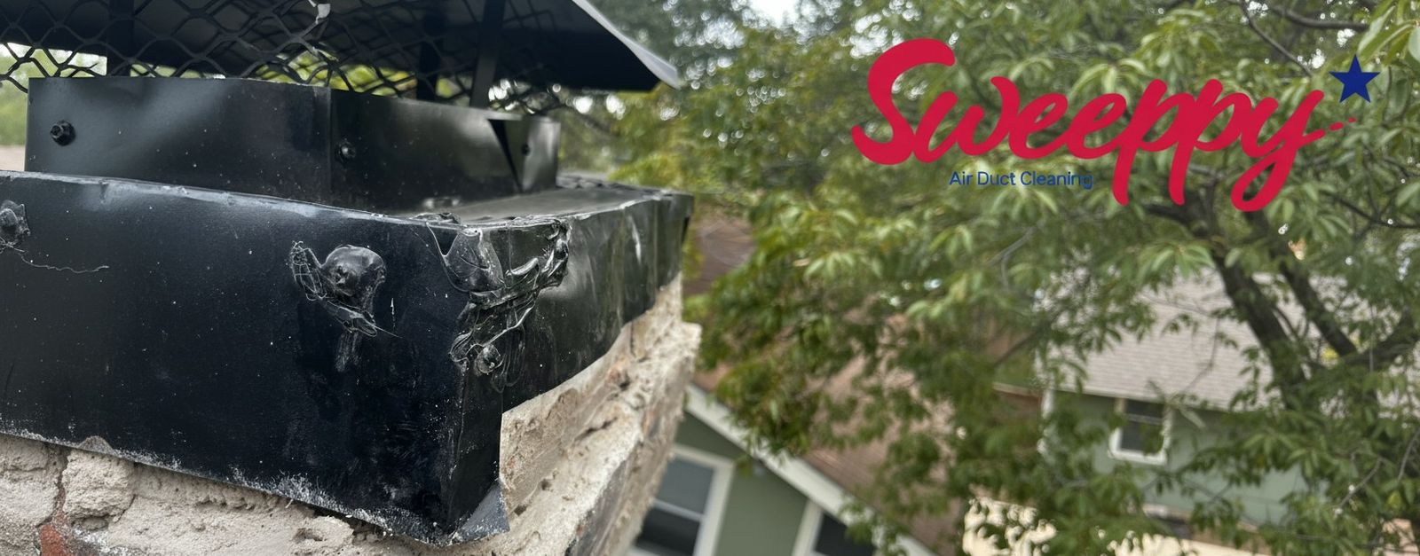 Sweeppy chimney sweep technician at work in San Antonio